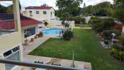 Junior-Suite Merlot - View from Balcony to Main Garden