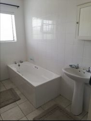 Bathroom with bath 