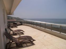Huge wraparound balcony with views up uninterrupted views up and down the coastline.