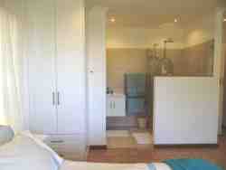 The main bedroom ensuite has a shower, basin and separate loo