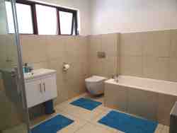 Spacious main Bathroom with shower, basin, bath and loo