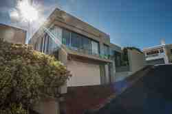 House with balcony and double garage