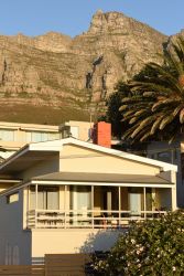 Surround yourself with Table Mountain and the 12 Apostles.  Sea view Deluxe Self-Catering Suite, private deck