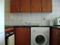 Kitchen with washing machine