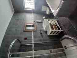 Bathroom with shower and bath