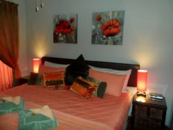 Unit 1 - A Cherry Tree. This superior unit has two rooms - one double room with the option of either 2 single beds or a king bed, en-suite shower room, one standard room with double/single bunker bed and an extra bathroom with bath.