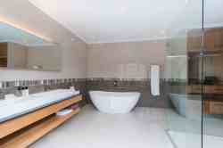 Bathroom with indoor & outdoor showers