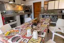 Sky Villa - Spacious fully equipped kitchen with an oven, stove, and fridge/freezer.