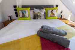 Sky Villa - Bedroom 1 Ensuite.  The room has aircon and a fan, which is a must on a hot summer's day! There is also free wifi.