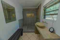 Remington Villa - Bedroom 1. Ensuite - Shower, toilet, and basin.