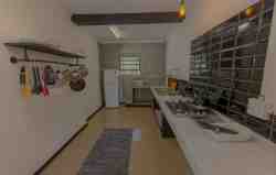 Remington Villa - Spacious fully equipped kitchen with an air fryer, stove, and fridge/freezer.