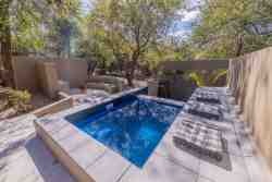 Remington Villa - Take a dip in the infinity pool on a hot summer's day! Or just chill on the day bed!