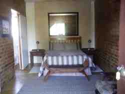 Queen and 1 single bed.

Bar fridge and TV