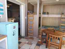 Sun Unit:  sleeps 6
double room d/bed separate room with 2 bunk beds , sleeps 4
1x Bathroom/shower
semi kitchenette: fridge, tv, microwave, tea/coffee station
leads to outside Patio where you can relax