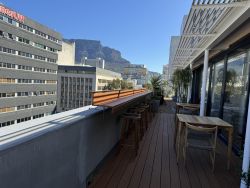 View from 6th floor with seating areas for individuals supporting The Lighthouse Holistic Welness 