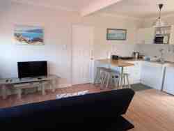 Big Thyme TV area and kitchenette