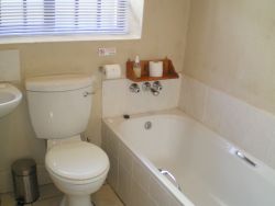 En-suite bathrooms, most rooms with full bath and shower.