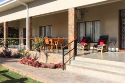 Relaxing porch with swimmingpool view