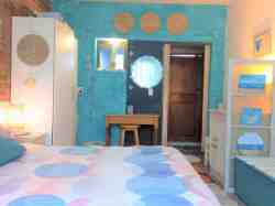 Kitchenette leading off bedroom.