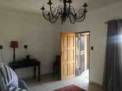 front door at the sitting room with security gate 