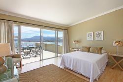 Each bedroom is en suite and has large, walk-in cupboards and every room has fabulous sea views. Superbly-appointed interiors rarely look more appealing than this