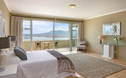 Each bedroom is en suite and has large, walk-in cupboards and every room has fabulous sea views. Superbly-appointed interiors rarely look more appealing than this