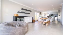 Indoor dining open plan with kitchen