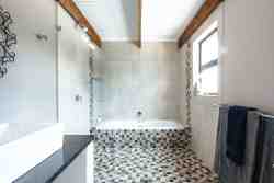 BLUEBERRY bathroom with bath ans shower