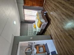 Room 5 with Queen size bed and 1 single bed
