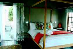 Our Protea Suite also has a small anteroom for extra single beds. All our rooms have a private outdoor balcony or patio