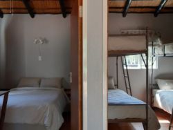 chalet Bedrooms. Quality Linen. Two bedrooms. 1st room a double, 2nd room is sleeps 4 singles.