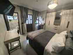 Deluxe suite with private bathroom and garden