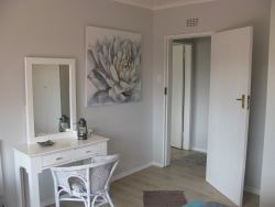 All bedrooms have a dressing table and are of a decent size.  We provide fans, heaters and hairdryers in all rooms. 