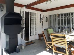 The house patio has a built in braai and folding doors that may be open or closed during the winter months 