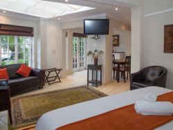 Room 3 Self catering unit bedroom opening into kitchen and dining area