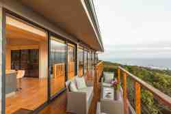 Balcony with full sea and forest views