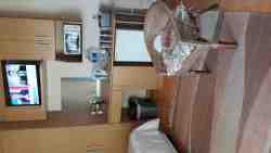 Flat 2 has two easy chairs, fridge and microwave