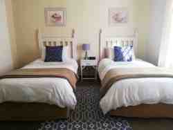Standard twin beds.