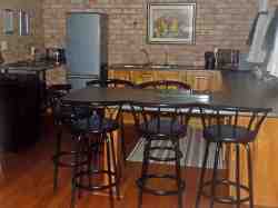 Anki's open plan kitchen, lounge and dining room