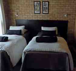 Guests choose between 2 single beds and a king size bed.  These are single beds.