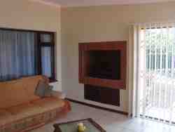 Spacious open plan lounge with braai (BBQ) facility