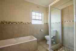 Bathroom with shower and bath