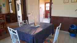 This is our shared Dining Area, right next to the kitchen and to the entertainment area.