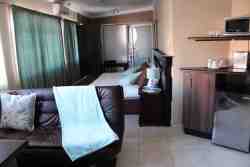Family Room with king size bed and sleeper couch