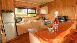 The Cabin has a fully equipped kitchen with cutlery and crockery, a fridge, a gas hob and oven, kettle, toaster and coffee making facilities.