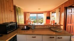 The open plan kitchen also looks out over the incredible view!