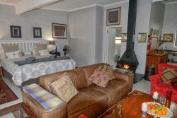 Open plan living with lounge and bedroom