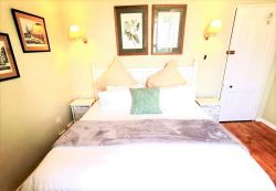 East Room - King or Twin beds. Kitchen nook & full bathroom ensuite