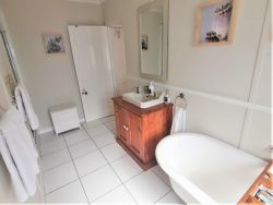 West Room bathroom with shower, Victorian bath