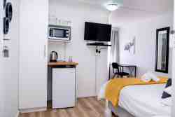 Standard Double Bed Room with desk, fridge and coffee making services